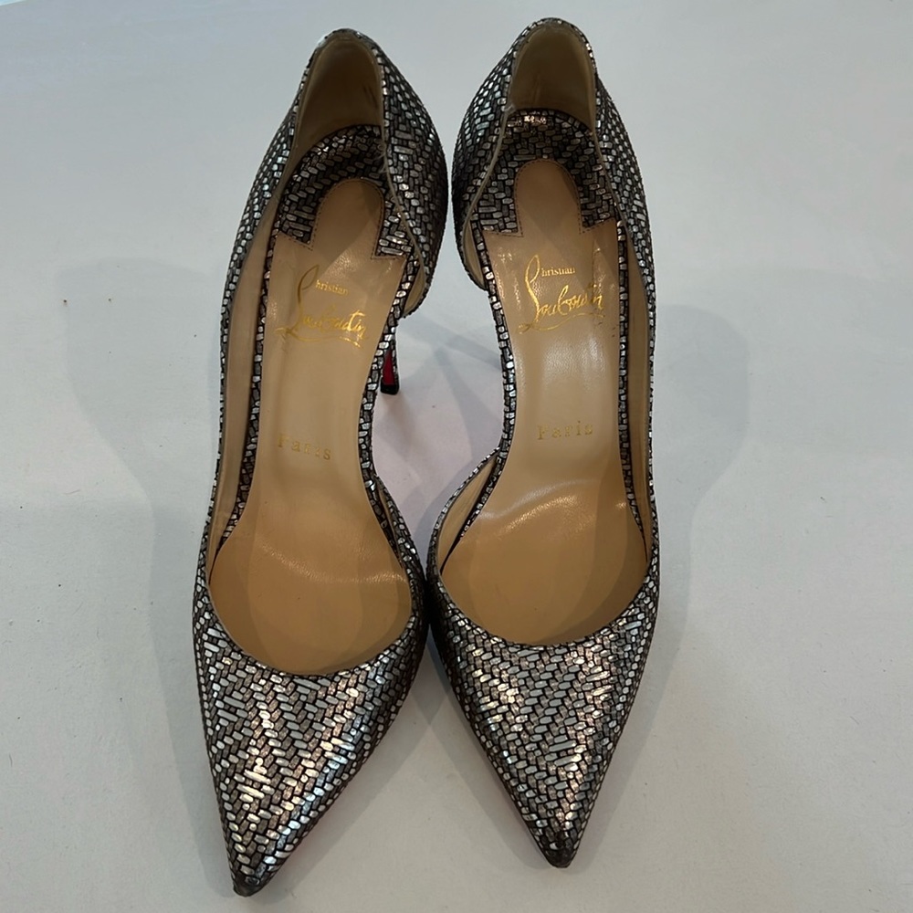 Authentic Christian Louboutin silver leather pattern high heels.